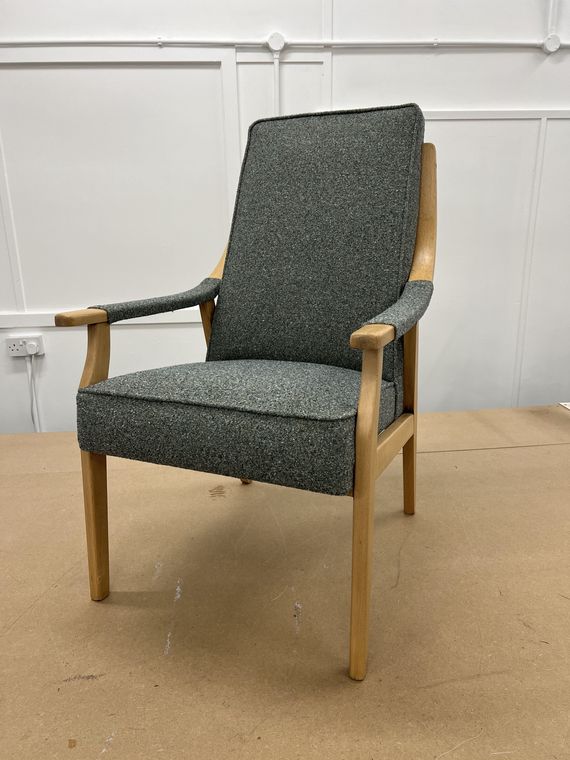Mid-century open-arm chair in a charcoal wool.