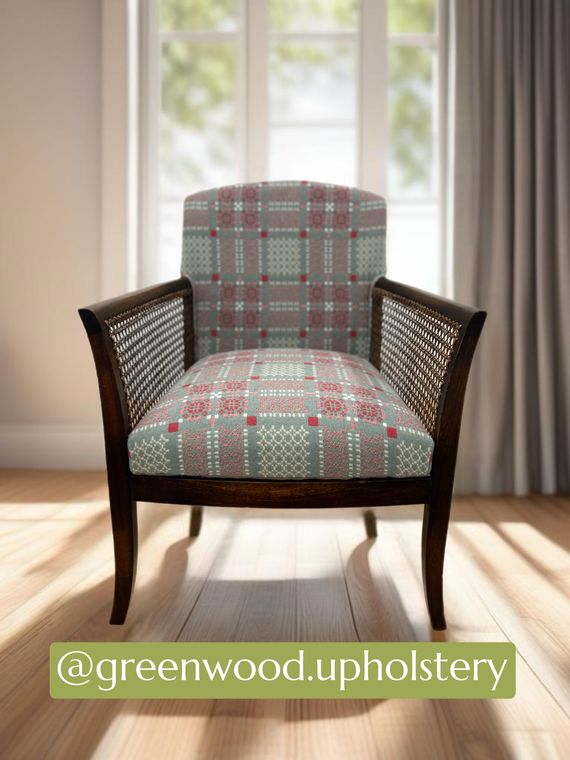 Caned bergère chair in a Welsh tapestry weave.