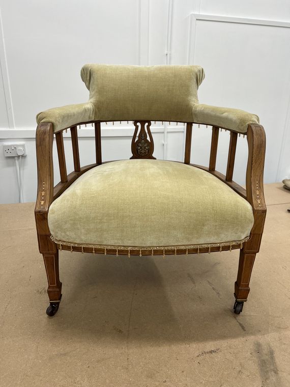 Victorian spindle-back tub chair in sage velvet.