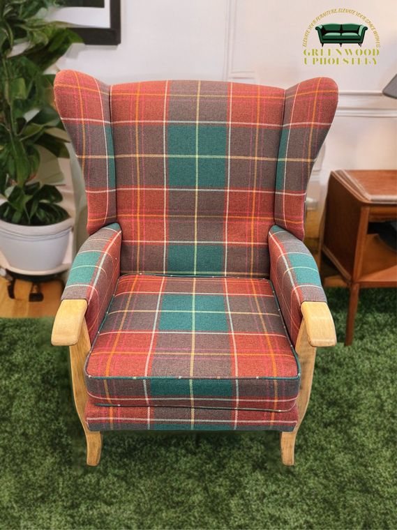 Wing-back armchair in an autumn tartan.
