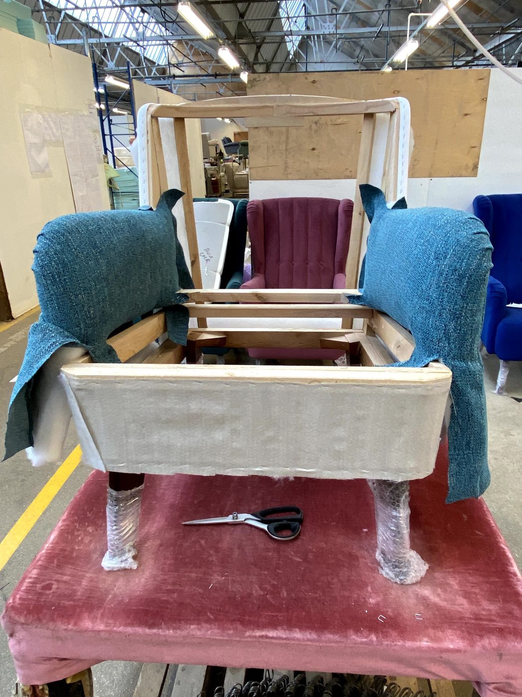 The first movement: each arm covered with the inside and outside faces cut as a single piece of the blue fabric.