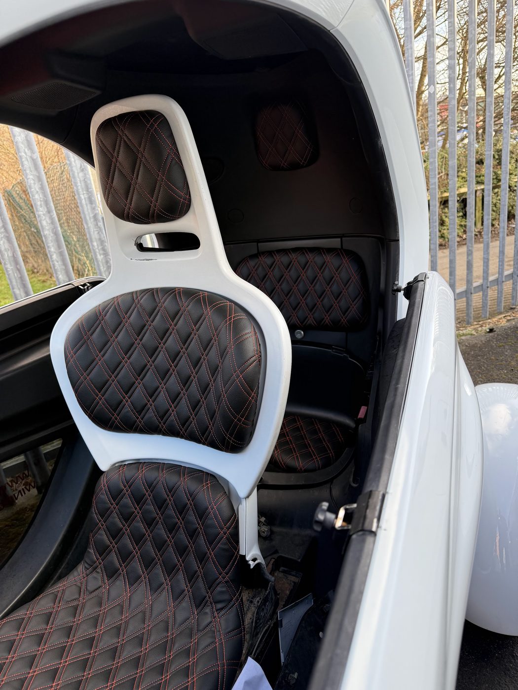 Both seats back in the car, and the cabin is a different place.